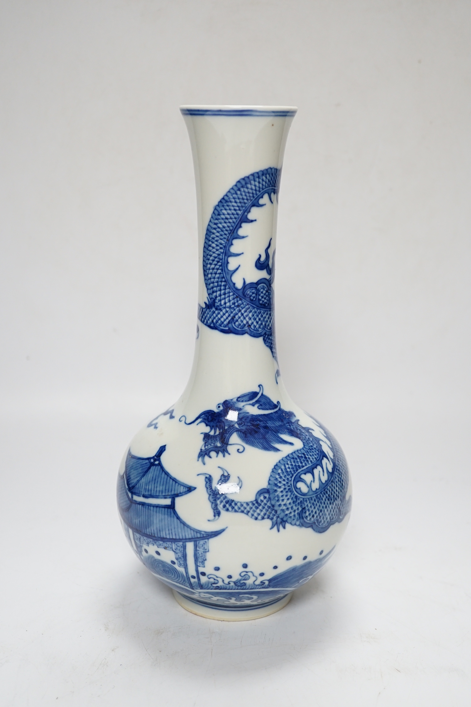 A Chinese blue and white dragon vase, 27cm high
